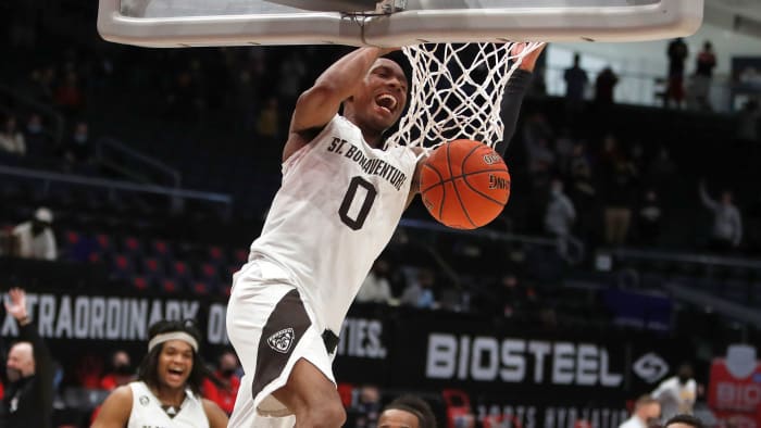 St. Bonaventure guard Kyle Lofton dunks the ball